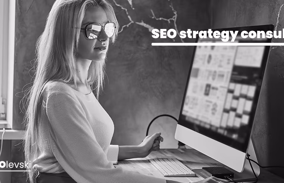 Professional working at a desktop computer analyzing digital dashboards, representing the role of an SEO strategy consultant planning search optimization strategies.